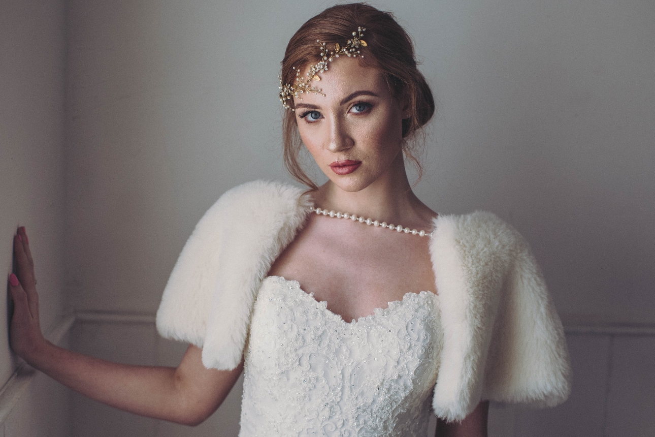Brides getting married this season will love the debut collection of faux fur cover ups from designer Polly Reid: Image 1