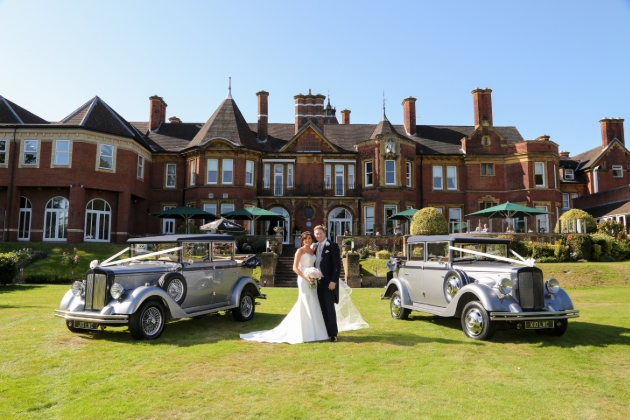 Moor Hall Hotel & Spa, Warwickshire, bride and groom on the gardens with wedding cars