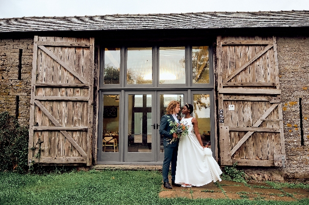 Bride and groom outside The Barn At Drovers