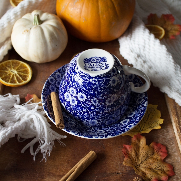  autumnal tablescape of a mug with pumpkins