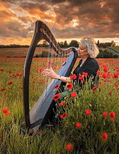 Helen Barley playing the harp