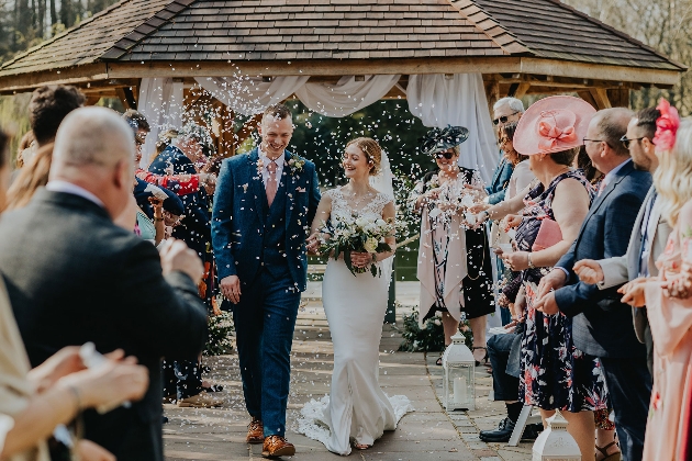 Guests throw confetti