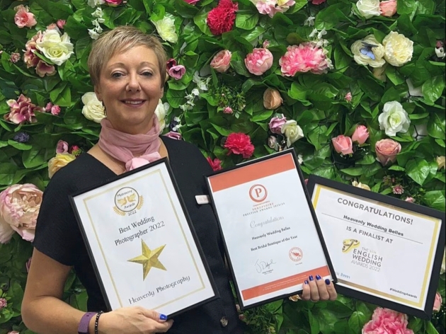 Deborah with her three award certificates