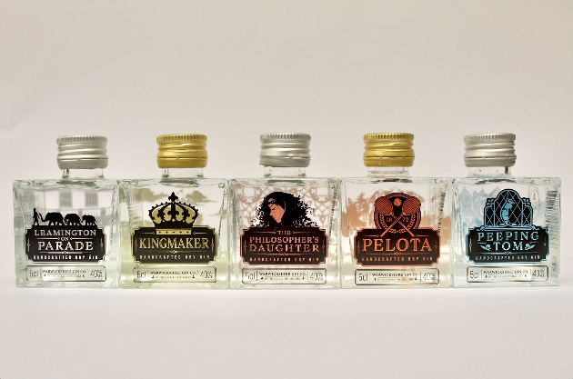 Five miniature gin bottles